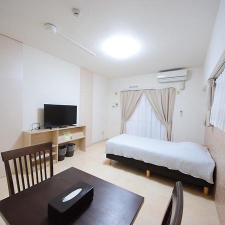 สเตย์ อิน ซูมูกะ โคกูไซสตรีท Hotel Tomari ภายนอก รูปภาพ