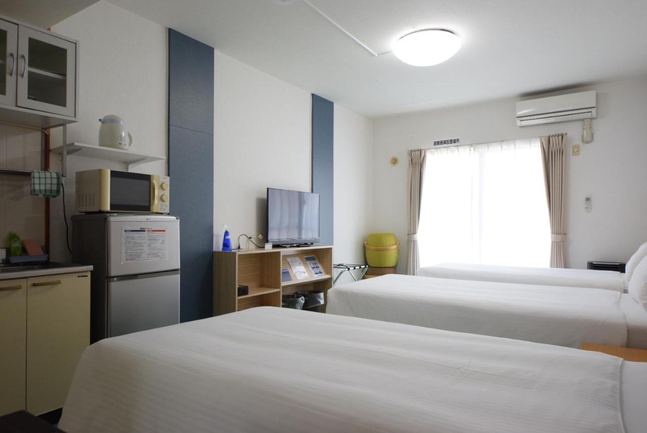 สเตย์ อิน ซูมูกะ โคกูไซสตรีท Hotel Tomari ภายนอก รูปภาพ