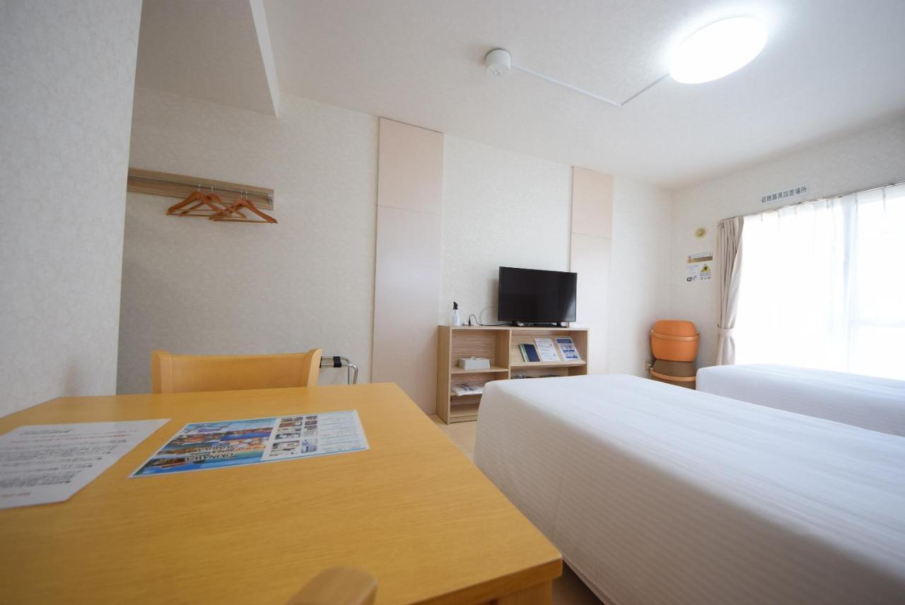 สเตย์ อิน ซูมูกะ โคกูไซสตรีท Hotel Tomari ภายนอก รูปภาพ