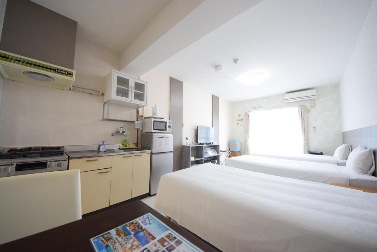 สเตย์ อิน ซูมูกะ โคกูไซสตรีท Hotel Tomari ภายนอก รูปภาพ