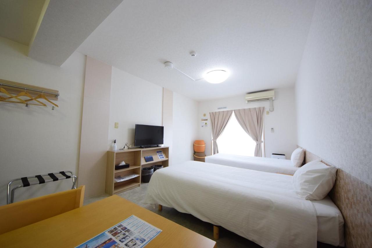 สเตย์ อิน ซูมูกะ โคกูไซสตรีท Hotel Tomari ภายนอก รูปภาพ