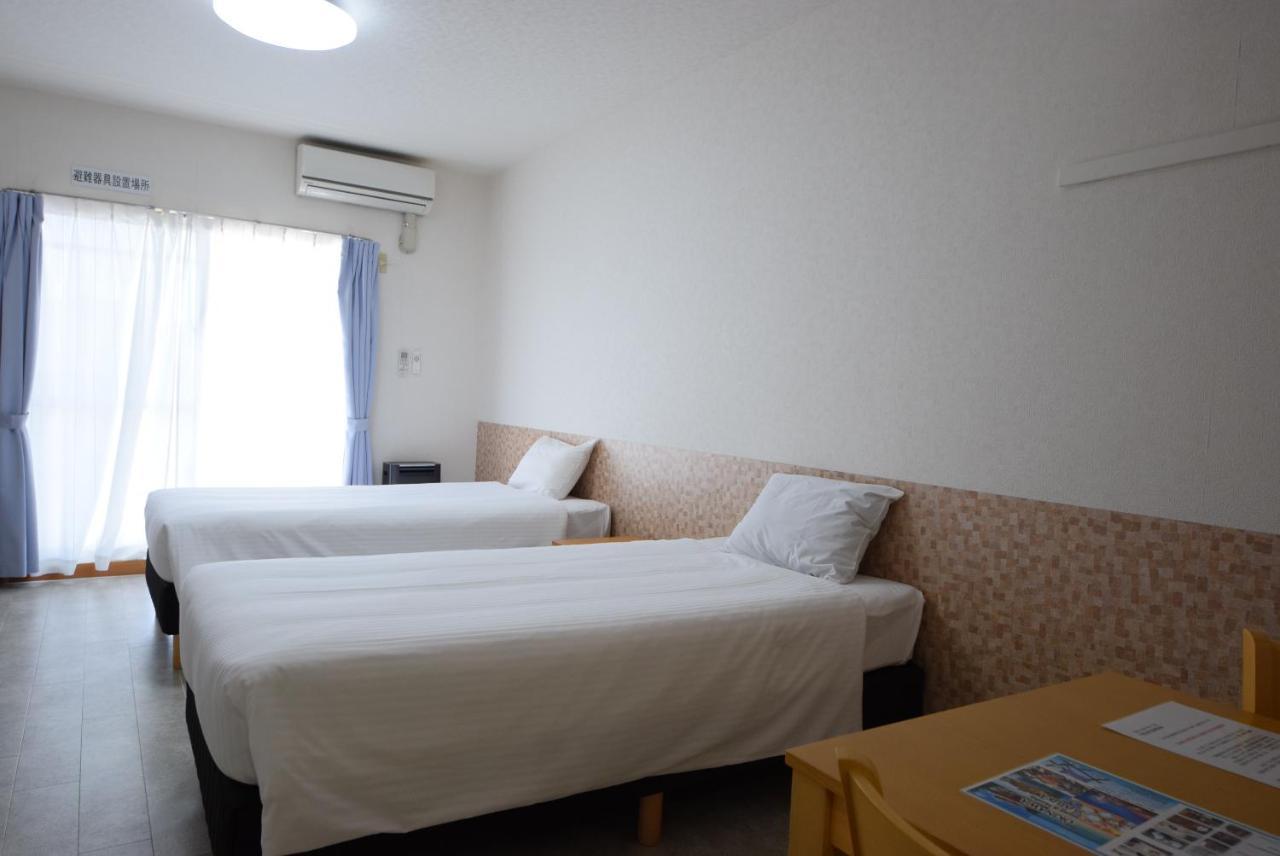 สเตย์ อิน ซูมูกะ โคกูไซสตรีท Hotel Tomari ภายนอก รูปภาพ