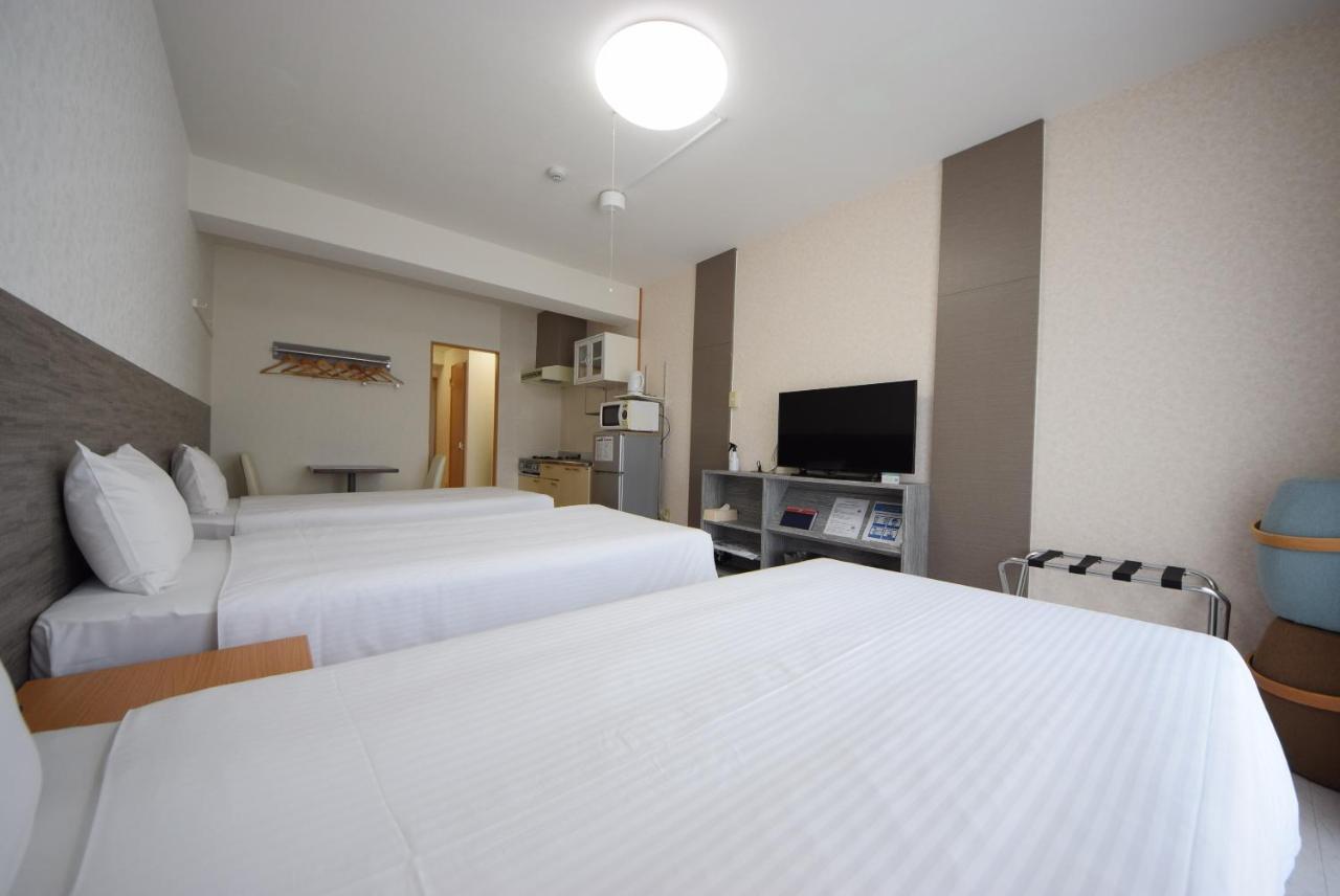 สเตย์ อิน ซูมูกะ โคกูไซสตรีท Hotel Tomari ภายนอก รูปภาพ