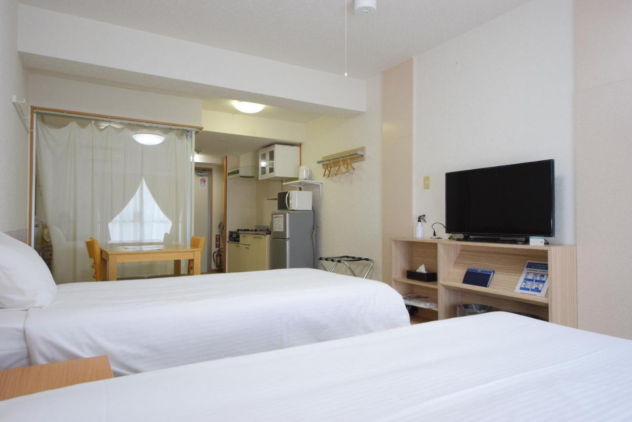 สเตย์ อิน ซูมูกะ โคกูไซสตรีท Hotel Tomari ภายนอก รูปภาพ