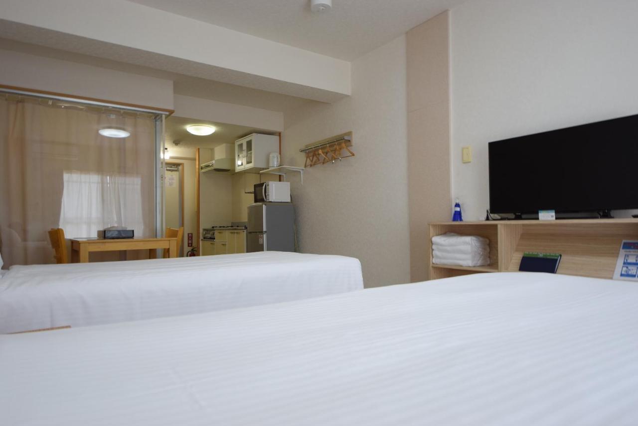 สเตย์ อิน ซูมูกะ โคกูไซสตรีท Hotel Tomari ภายนอก รูปภาพ