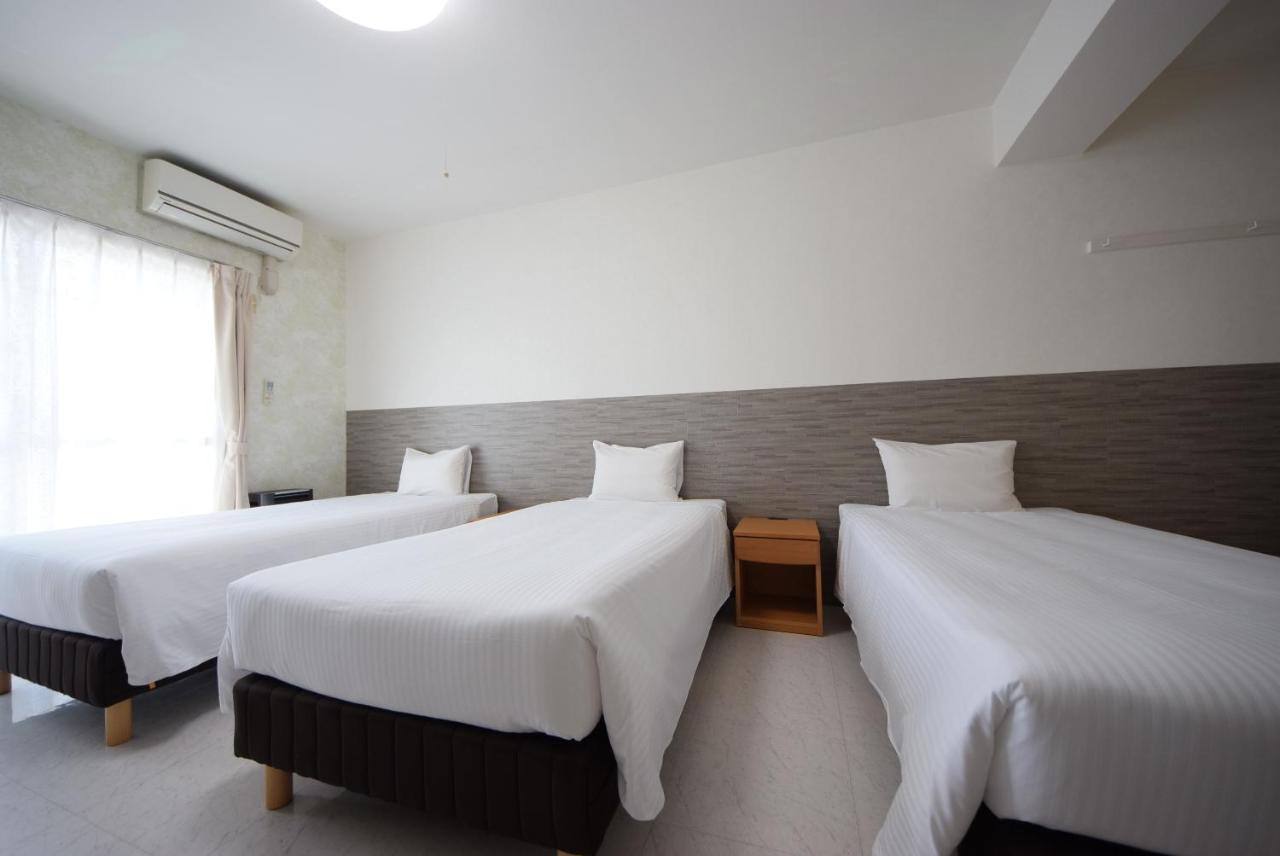 สเตย์ อิน ซูมูกะ โคกูไซสตรีท Hotel Tomari ภายนอก รูปภาพ