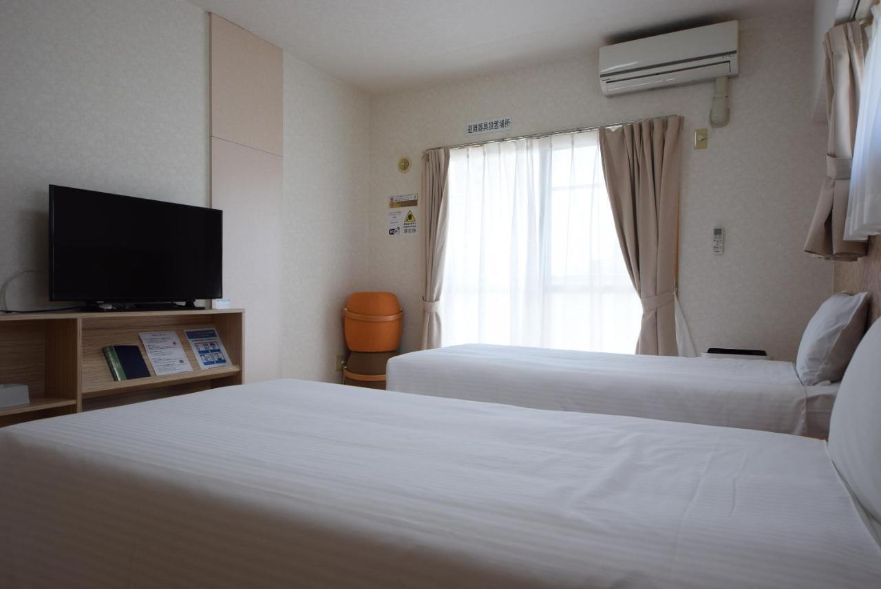 สเตย์ อิน ซูมูกะ โคกูไซสตรีท Hotel Tomari ภายนอก รูปภาพ