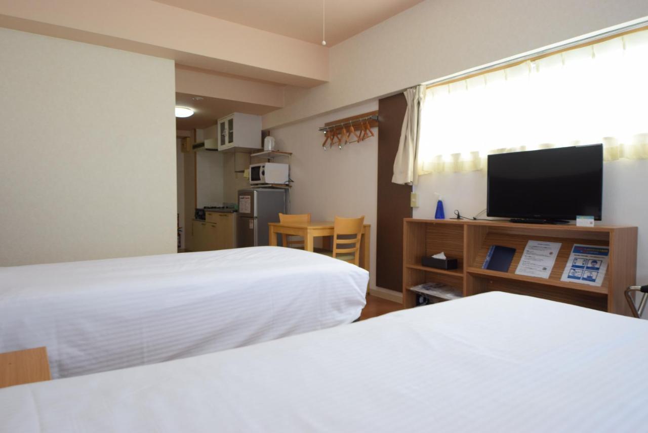 สเตย์ อิน ซูมูกะ โคกูไซสตรีท Hotel Tomari ภายนอก รูปภาพ
