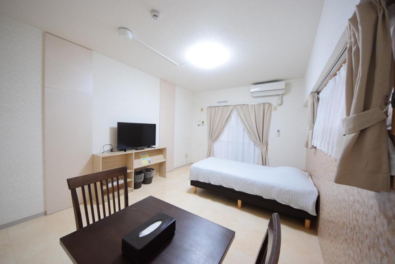 สเตย์ อิน ซูมูกะ โคกูไซสตรีท Hotel Tomari ภายนอก รูปภาพ