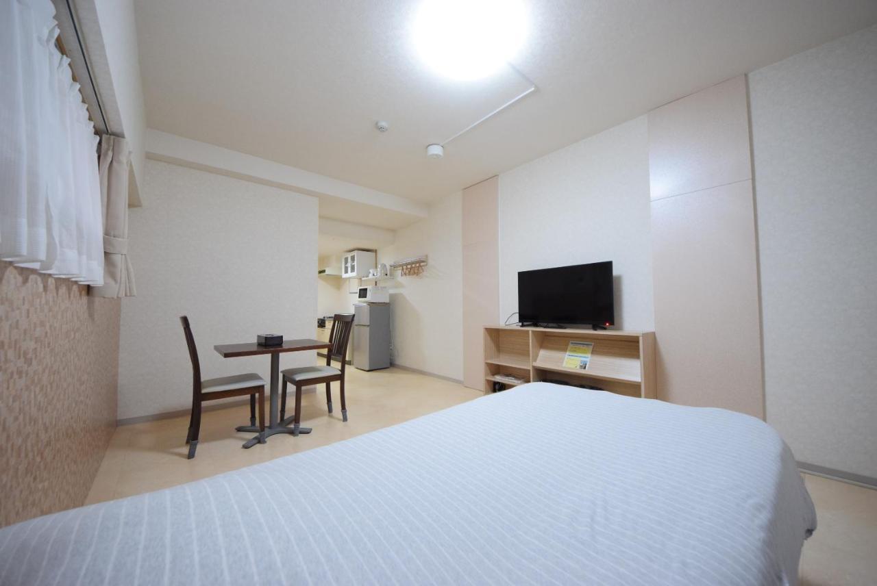 สเตย์ อิน ซูมูกะ โคกูไซสตรีท Hotel Tomari ภายนอก รูปภาพ