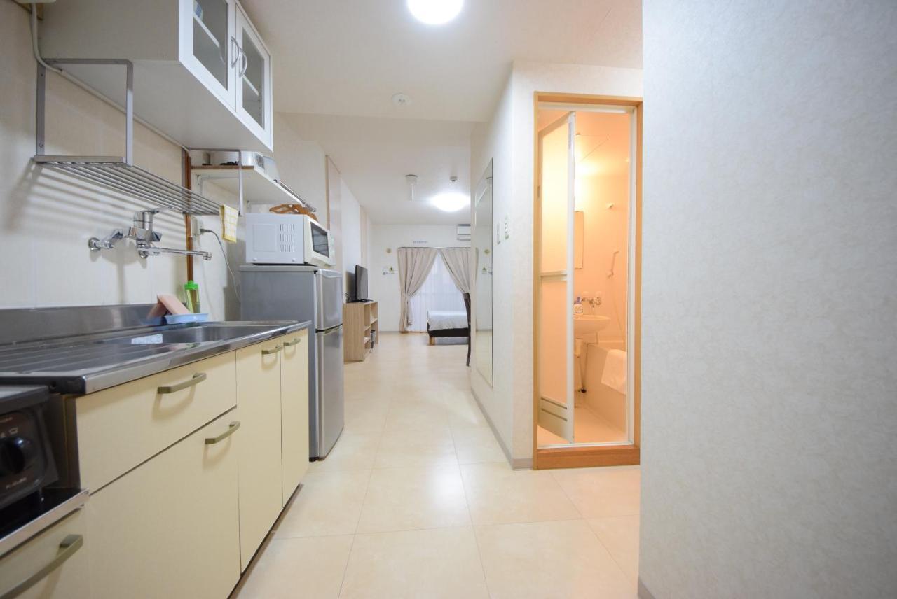 สเตย์ อิน ซูมูกะ โคกูไซสตรีท Hotel Tomari ภายนอก รูปภาพ
