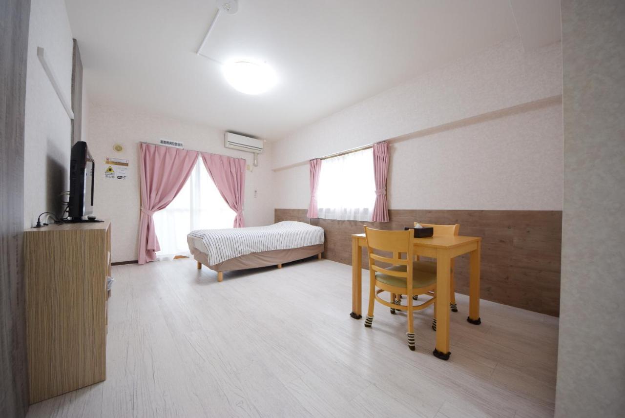 สเตย์ อิน ซูมูกะ โคกูไซสตรีท Hotel Tomari ภายนอก รูปภาพ