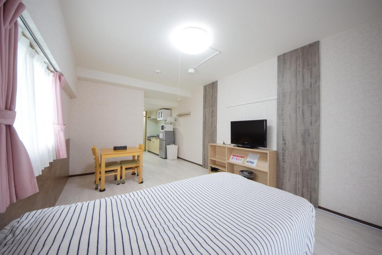 สเตย์ อิน ซูมูกะ โคกูไซสตรีท Hotel Tomari ภายนอก รูปภาพ